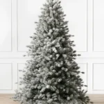 Künstliche Weihnachtsbäume mit Schnee aus dem Elsass